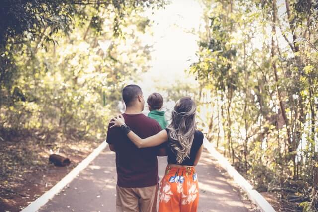 family walking on community path