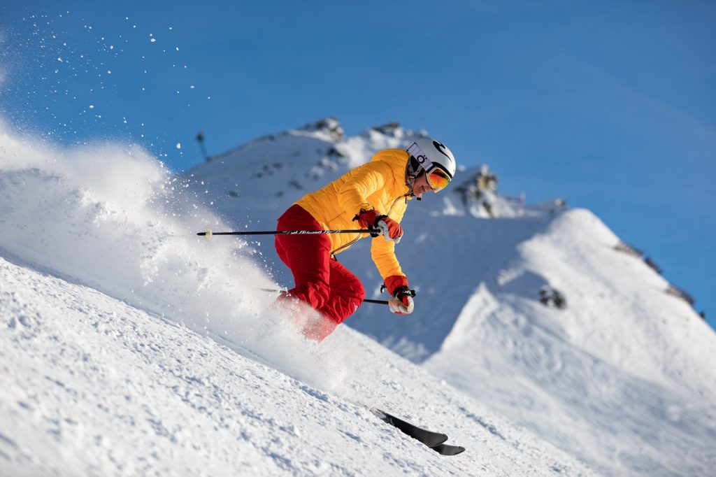 Skier going down the mountain