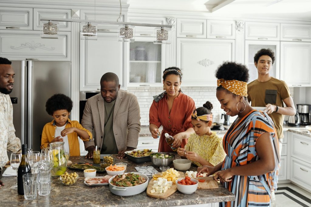 Big family gathering in kitchen